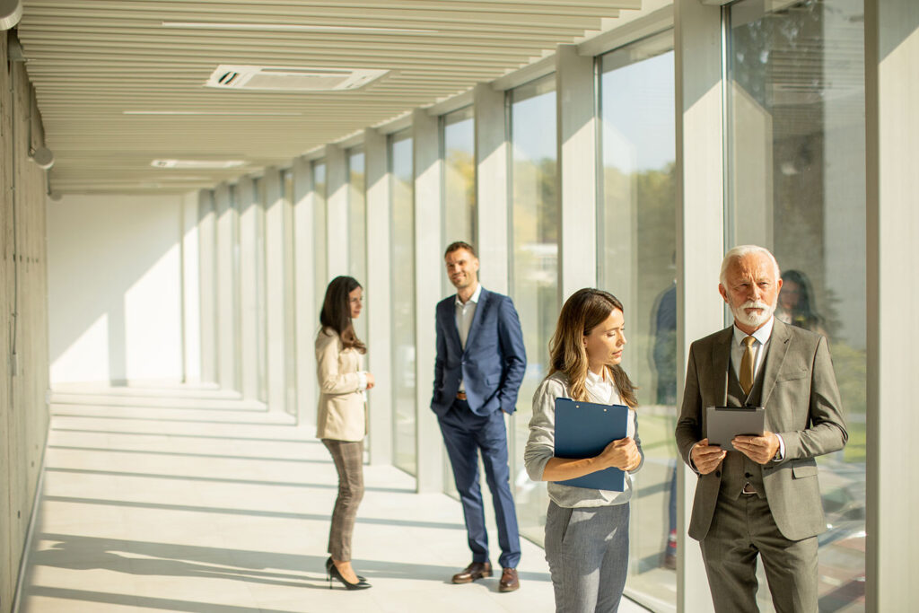 image of corporate employees in an office building